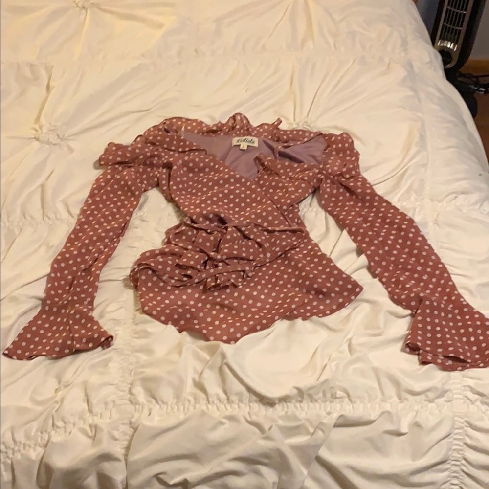 Ruffled wrap around polka dot top